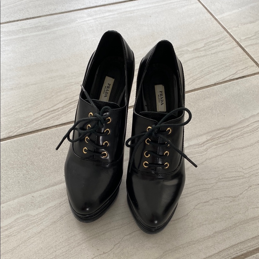 Prada Black Leather Flats with Gold Eyelets